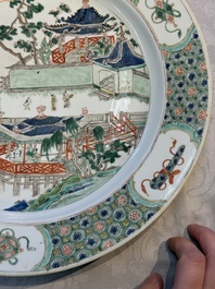 A Chinese famille verte 'Pavilions and Lotus Pond' dish, swastika mark, Kangxi