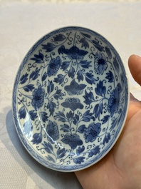 Nine Chinese blue and white cups and 12 saucers, Kangxi