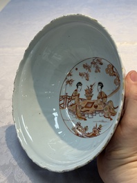 A pair of Chinese  iron-red and gilt-decorated 'Elegant Ladies and Tulips' bowls and covers, Kangxi