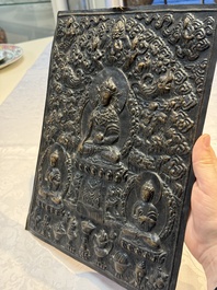 Three Tibetan copper repouss&eacute; plaques with Buddhist subjects, 19th C.