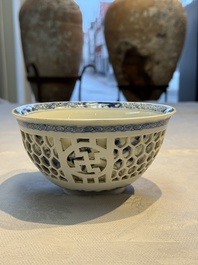 A Chinese blue and white reticulated double-walled 'Swastika' bowl, Kangxi