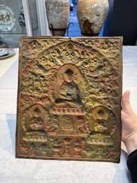 Three Tibetan copper repouss&eacute; plaques with Buddhist subjects, 19th C.