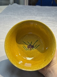 A rare pair of Chinese sancai yellow-ground 'Brinjal' bowls, Tianqi mark, 19th C.
