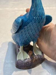 A pair of Chinese turquoise-glazed ducks and a pair of verte biscuit quail-form covered boxes, 20th C.