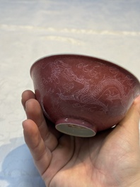 Four Chinese sgraffito ruby-ground 'Dragon' cups and three plates, Qianlong mark, Republic