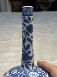 A rare Chinese 'G-marked' blue and white bottle vase with floral design, Kangxi