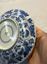 Nine Chinese blue and white cups and 12 saucers, Kangxi