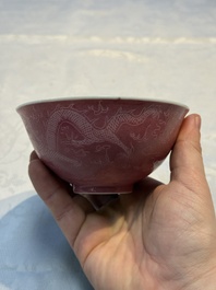 Four Chinese sgraffito ruby-ground 'Dragon' cups and three plates, Qianlong mark, Republic