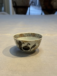 A Chinese gilt-decorated black-enamelled 'Antiquities' cup, Yongzheng/Qianlong