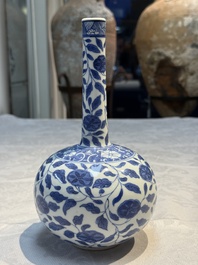A rare Chinese 'G-marked' blue and white bottle vase with floral design, Kangxi