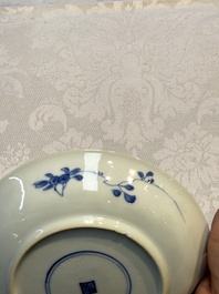Nine Chinese blue and white cups and 12 saucers, Kangxi