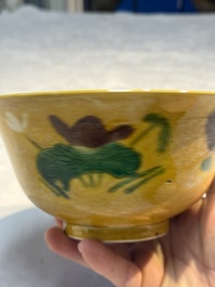 A rare pair of Chinese sancai yellow-ground 'Brinjal' bowls, Tianqi mark, 19th C.