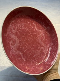 Four Chinese sgraffito ruby-ground 'Dragon' cups and three plates, Qianlong mark, Republic
