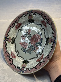 Four Chinese famille rose plates and a dish with floral design, Yongzheng/Qianlong