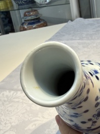Three Chinese blue and white vases, one covered, Kangxi mark, 19th C. and later