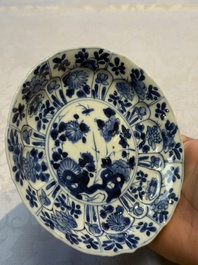 Nine Chinese blue and white cups and 12 saucers, Kangxi