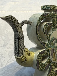 A pair of Chinese verte biscuit 'Shou' wine ewers, 19th C.