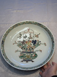 A Chinese famille verte 'Flower Basket' dish, lozenge mark, Kangxi
