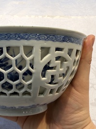 A Chinese blue and white reticulated double-walled 'Swastika' bowl, Kangxi