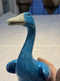 A pair of Chinese turquoise-glazed ducks and a pair of verte biscuit quail-form covered boxes, 20th C.