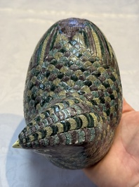 A pair of Chinese turquoise-glazed ducks and a pair of verte biscuit quail-form covered boxes, 20th C.