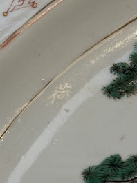 A Chinese famille verte 'Pavilions and Lotus Pond' dish, swastika mark, Kangxi