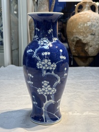 Three Chinese blue and white vases, one covered, Kangxi mark, 19th C. and later