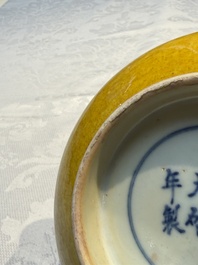 A rare pair of Chinese sancai yellow-ground 'Brinjal' bowls, Tianqi mark, 19th C.