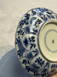 Nine Chinese blue and white cups and 12 saucers, Kangxi