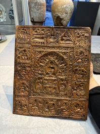 Three Tibetan copper repouss&eacute; plaques with Buddhist subjects, 19th C.