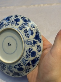 Nine Chinese blue and white cups and 12 saucers, Kangxi