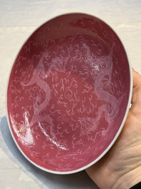 Four Chinese sgraffito ruby-ground 'Dragon' cups and three plates, Qianlong mark, Republic