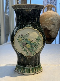 A Chinese verte biscuit black-ground vase and a covered jar, Xuande and Kangxi mark, 19th C.