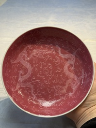 Four Chinese sgraffito ruby-ground 'Dragon' cups and three plates, Qianlong mark, Republic