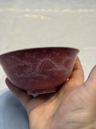 Four Chinese sgraffito ruby-ground 'Dragon' cups and three plates, Qianlong mark, Republic