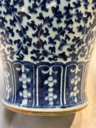 Three Chinese blue and white vases, one covered, Kangxi mark, 19th C. and later