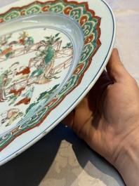 A Chinese famille verte 'Elegant Ladies and Playing Boys' dish, Chenghua mark, Kangxi