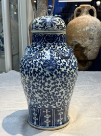 Three Chinese blue and white vases, one covered, Kangxi mark, 19th C. and later