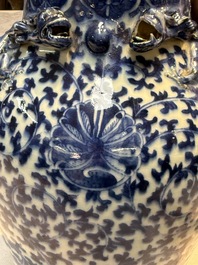 Three Chinese blue and white vases, one covered, Kangxi mark, 19th C. and later