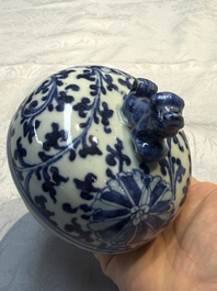 Three Chinese blue and white vases, one covered, Kangxi mark, 19th C. and later
