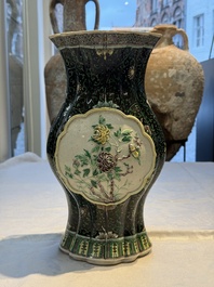 A Chinese verte biscuit black-ground vase and a covered jar, Xuande and Kangxi mark, 19th C.