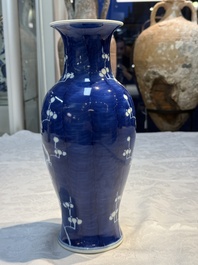 Three Chinese blue and white vases, one covered, Kangxi mark, 19th C. and later