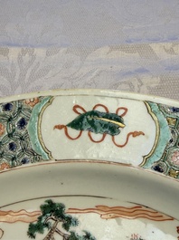 A Chinese famille verte 'Pavilions and Lotus Pond' dish, swastika mark, Kangxi