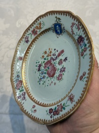 Two Chinese famille rose armorial saucers, Qianlong