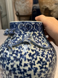Three Chinese blue and white vases, one covered, Kangxi mark, 19th C. and later
