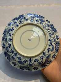 Nine Chinese blue and white cups and 12 saucers, Kangxi