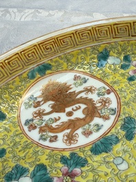 A Chinese famille rose 'Millefleurs' plate, a 'Dragons' plate, and a Nanking famille verte caf&eacute;-au-lait-ground bowl, Qianlong marks, 19/20th C.