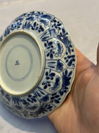 Nine Chinese blue and white cups and 12 saucers, Kangxi