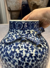 Three Chinese blue and white vases, one covered, Kangxi mark, 19th C. and later