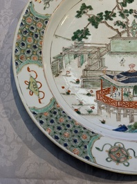 A Chinese famille verte 'Pavilions and Lotus Pond' dish, swastika mark, Kangxi